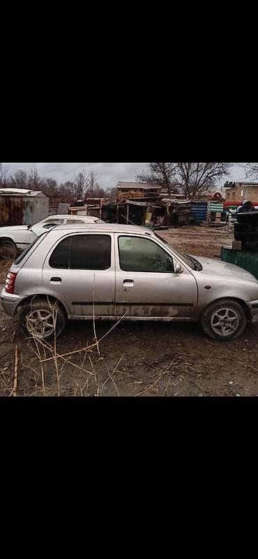 кресло водителя: Nissan March: 2000 г., 1 л, Автомат, Бензин, Хэтчбэк — 4
