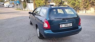 бензиновый картинг: Daewoo Nubira: 1998 г., Механика, Бензин, Универсал — 10