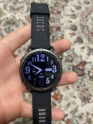 GARMIN WATCH. Смарт‑часы спортивного типа с круглым дисплеем и