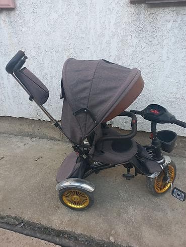 Детский трехколесный велосипед‑коляска с родительской ручкой -