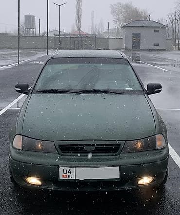 Daewoo Nexia: 1996 г., 1.6 л, Механика, Бензин, Седан