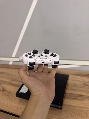 game controller: Sony PlayStation 3 (Slim). Игровая приставка с жёстким диском 149 ГБ — 5