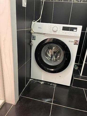 Стиральная машина Midea, фронтальная загрузка. Покупали месяц назад