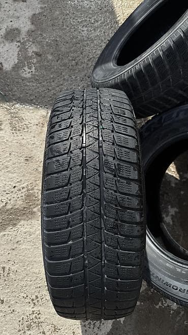 65: Шины 235 / 65 / R 17, Зима, Б/у, Комплект, Falken — 2