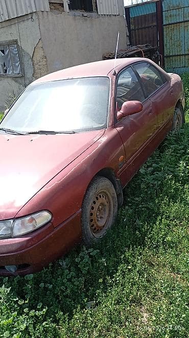 geely galaxy e5: Mazda 626: 1992 г., Механика, Седан — 4