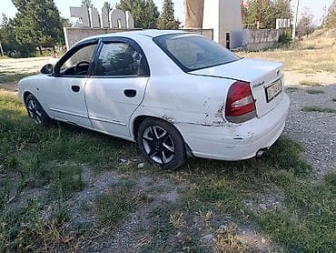 Daewoo Nubira: 2002 г., Механика, Бензин, Седан — 6