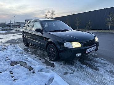 срочно мазда: Mazda 323: 2000 г., 1.8 л, Механика, Бензин, Универсал — 1