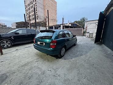 Mazda 323: 1999 г., 1.5 л, Автомат, Бензин, Хэтчбэк — 3