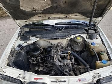 цена бобкат: Audi 100: 1992 г., Универсал — 9