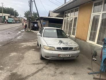 Daihatsu : 2004 г., 1.5 л, Механика, Бензин, Седан — 1