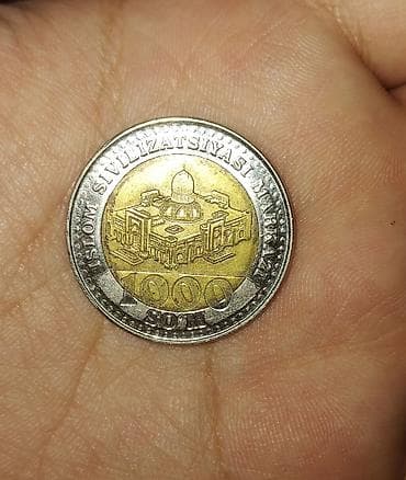 нумизматика: Памятная биметаллическая монета Узбекистана «Islom Sivilizatsiyasi — 1