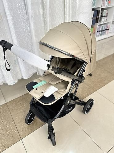 Прогулочная коляска Kidilo, бежевый цвет. Основные особенности: - — 9