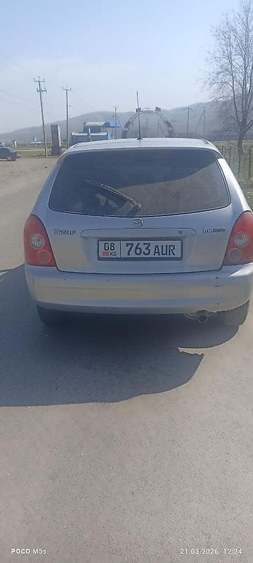 chery tiggo: Mazda 323: 2003 г., 1.6 л, Ручные, Бензин, Хэтчбэк — 2