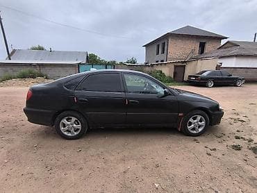 Транспорт: Toyota Avensis: 2000 г., 1.8 л, Механика, Бензин, Лифтбек — 1
