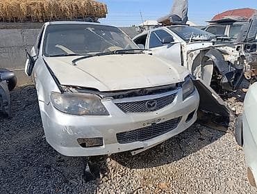 Mazda Familia/323 BJ (универсал) — автомобиль на разбор Модель и