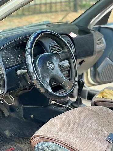 e star: Nissan Primera: 1993 г., 2 л, Механика, Бензин, Седан — 6