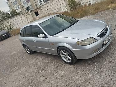 рейка на 210: Mazda 323: 2003 г., 1.5 л, Механика, Универсал — 9