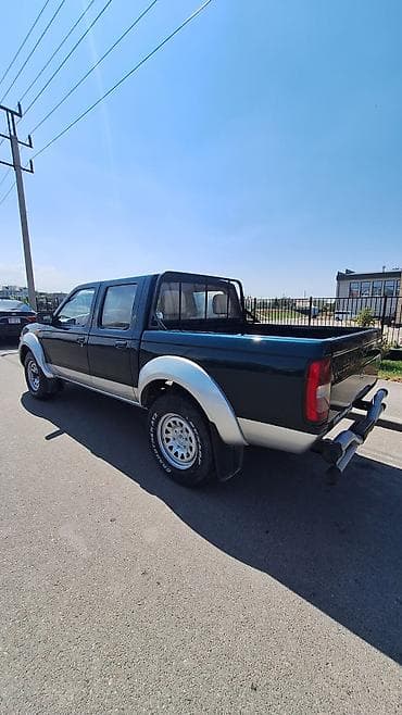 Nissan Navara: 2015 г., 2.4 л, Механика, Бензин, Пикап — 6