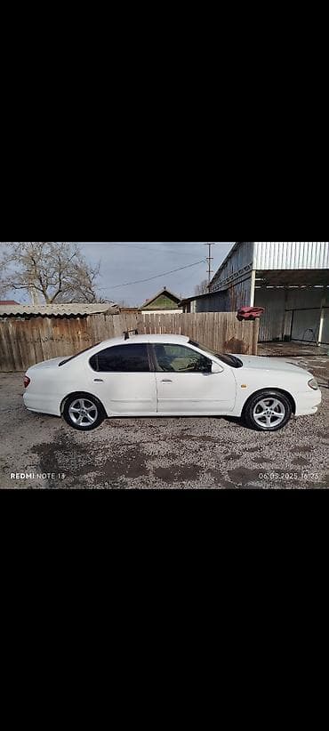 taiota karola: Nissan Bluebird: 1999 г., Автомат, Седан — 3