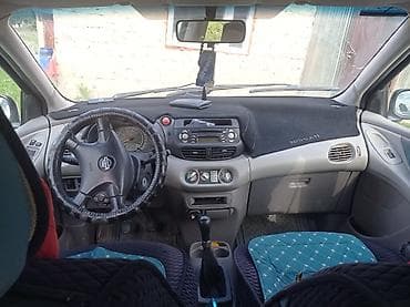 bew e34: Nissan Tino: 2002 г., Автомат, Минивэн — 3