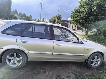 авто сокулук: Mazda 323: 2003 г., 1.6 л, Кол менен иштөөчү, Бензин, Хетчбек — 3
