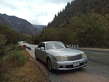 авто киа: Nissan Gloria: 1999 г., Автомат — 9