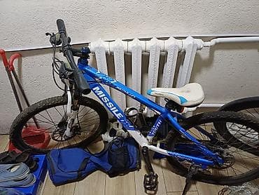 Предлагается велосипед MISSILE с дисковыми тормозами Shimano синего