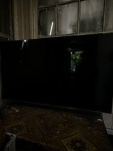 xbox 360 e: Телевизор с плоским экраном, диагональ ориентировочно 55–65". - — 3