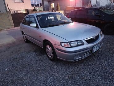 срочно продаю в связи с переездом: Mazda 626: 2000 г., 1.8 л, Механика, Бензин, Хетчбек — 12