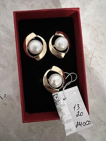 Ювелирные изделия: Комплект украшений из серебра 925 пробы с жемчугом. Состав: - Серьги — 1