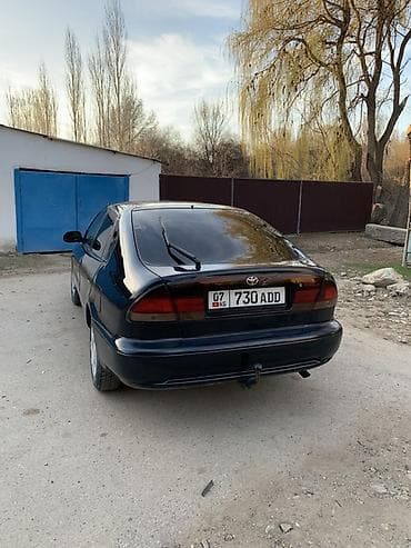 тез арада: Toyota Corolla: 1994 г., Кол менен иштөөчү, Бензин, Лифтбек — 3