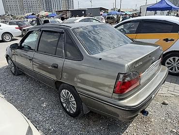 колонку: Daewoo Nexia: 2003 г., 1.6 л, Ручные, Бензин, Седан — 7