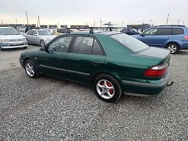 посадка авто: Mazda 626: 1997 г., 1.8 л, Механика, Бензин, Седан — 4