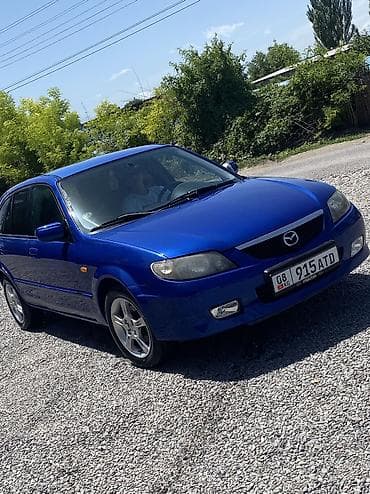 фикс токмок: Mazda 323: 2003 г., 1.6 л, Механика, Бензин, Хэтчбэк — 1