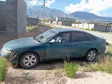 Транспорт: Mazda 626: 1993 г., 2.2 л, Механика, Бензин, Седан — 4