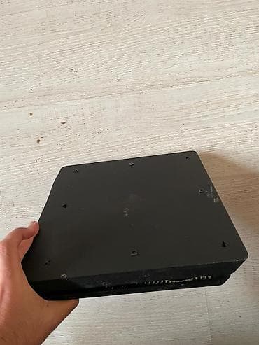 сони клуб: Игровая консоль Sony PlayStation 4 Slim (черная) - Компактный корпус — 3