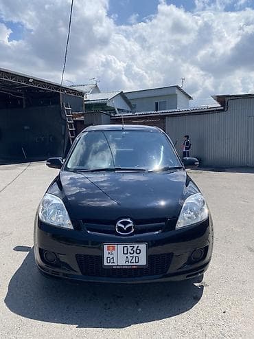 күзгү: Mazda Demio: 2004 г., 1.5 л, Автомат, Бензин, Хетчбек — 2