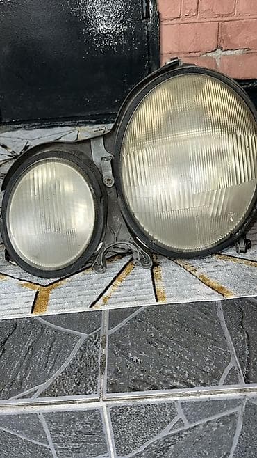 шторка w210: Передняя левая фара Mercedes-Benz — 2