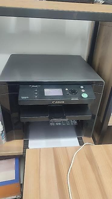 Компьютеры, ноутбуки и планшеты: Многофункциональное устройство Canon (лазерное, монохромное) - — 1