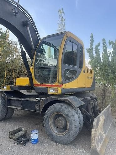 продажа эксковатор: Экскаватор, Volvo, 1997 г., Колесный — 5