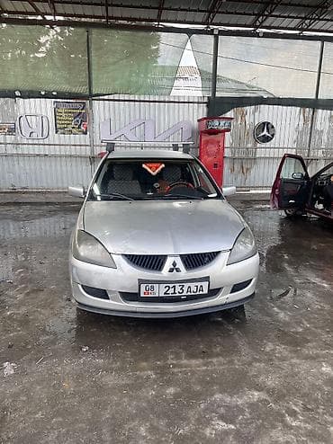 bmv 750: Mitsubishi Lancer: 2003 г., 1.6 л, Механика, Газ, Универсал — 4