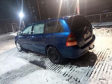 болуп: Toyota Corolla: 2002 г., 1.4 л, Кол менен иштөөчү, Бензин, Универсал — 3