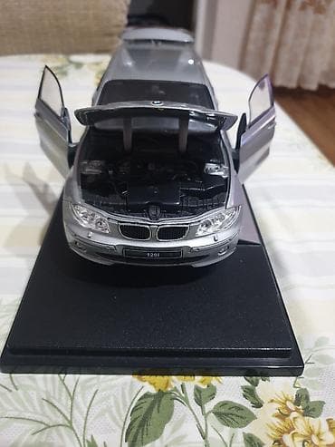 ra 1: Коллекционная масштабная модель BMW 120i (Welly). Зеркала дверные — 3