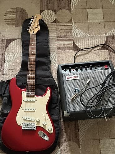 Музыкальные инструменты: - Электрогитара Squier by Fender в стиле Stratocaster, цвет Candy — 1