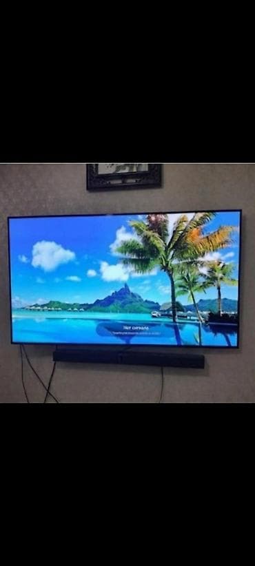 LG OLED телевизор 65 дюймов 2017 года работает всё хорошо очень тонкий
