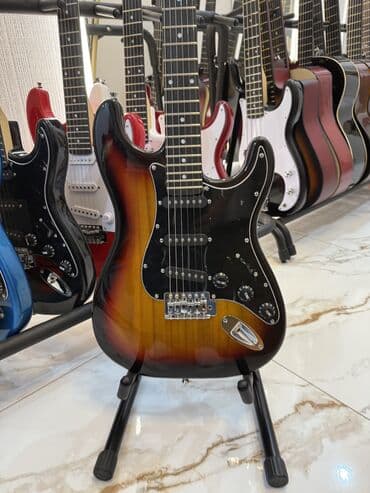 Гитаралар: Электрогитара новая, стратокастер, ST, Stratocaster. Все в наличии В — 8