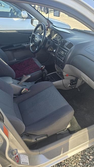 golf 3 universal: Mazda 323: 2002 г., 1.6 л, Ручные, Бензин, Универсал — 7