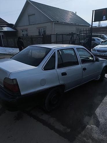 124 е: Daewoo Nexia: 1994 г. — 2