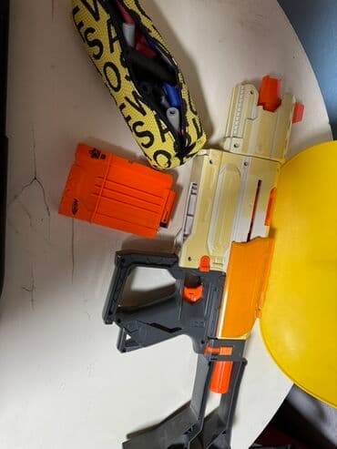 сколько стоит пистолет который стреляет орбизами: Бластер с пульками — 1