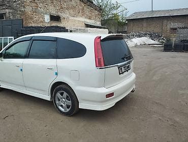 q 7: Honda Stream: 2003 г., 2 л, Автомат, Бензин, Универсал — 2